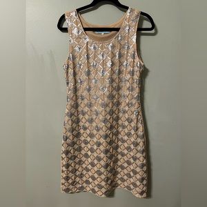 Knee length sequence dress.